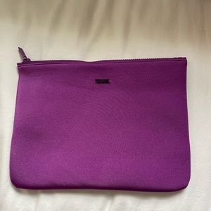 Purple triangl bag .